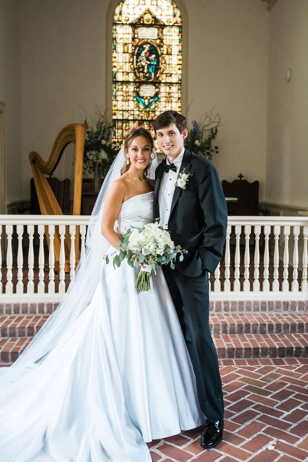 Bride and groom portrait on a Southern porch
